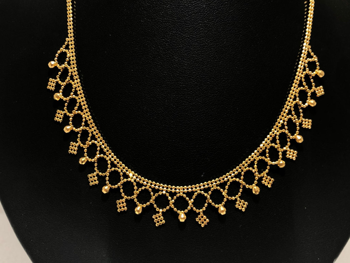 
                  
                    Gold Necklace
                  
                